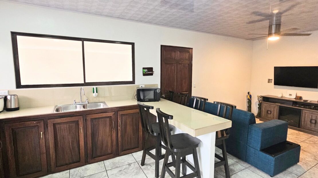 Turnkey 3BR Airbnb home for sale in gated community with a Pool just Minutes from La Fortuna