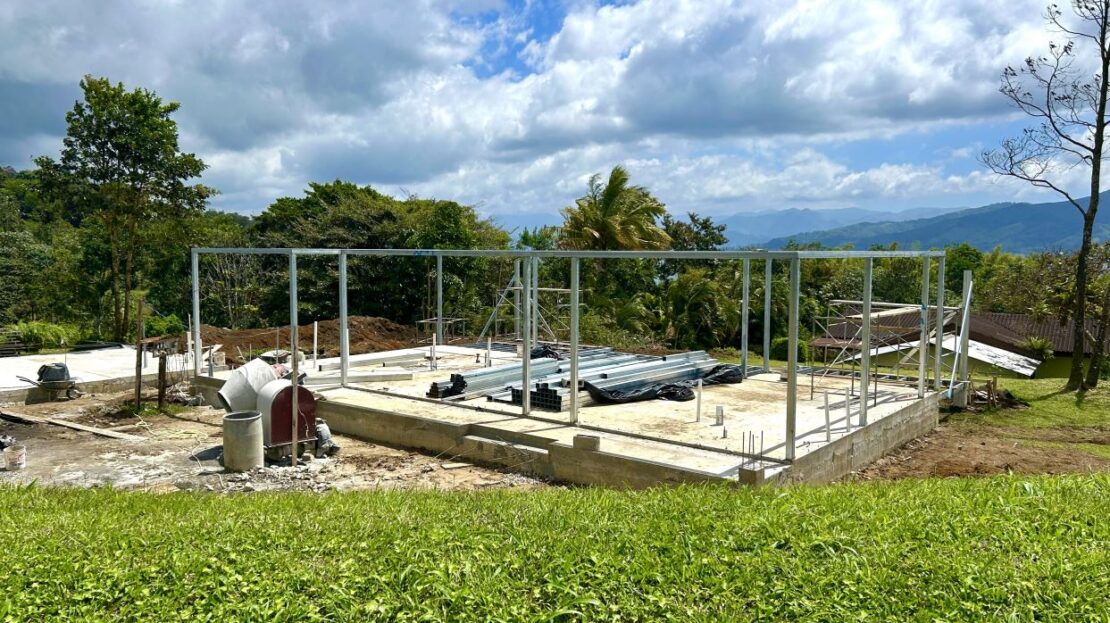 Nuevo Arenal – Brand-New 2BR/2BA Home with Garage & Development Potential in Prestigious Gated Community