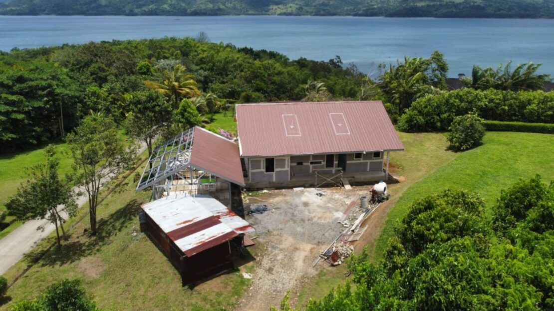 Nuevo Arenal – Brand-New 3BR/3BA Home with Garage & Development Potential in Prestigious Gated Community