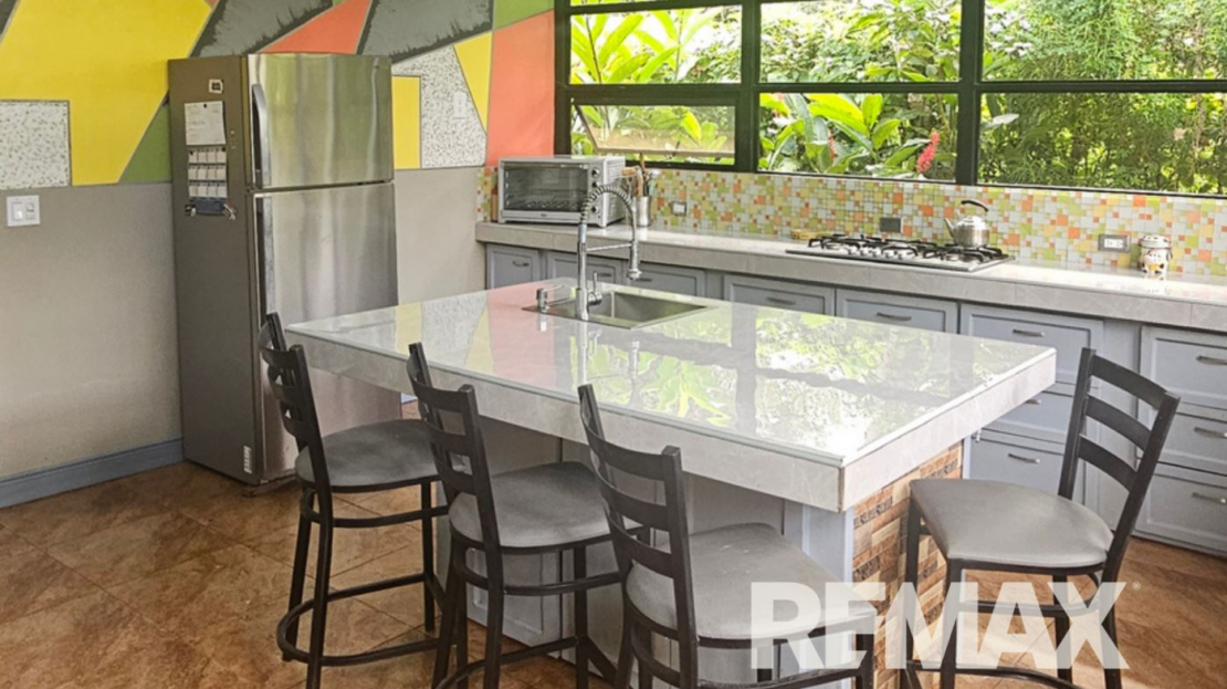 Fenced Property Near La Fortuna – Garage with Guest House Potential!