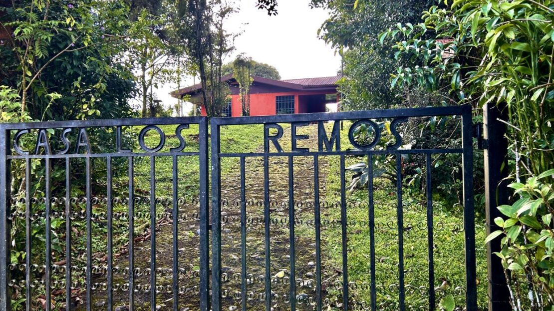 Charming Hillside Cottage on 1.4 Acres with Panoramic Lake Arenal Views and Development Potential